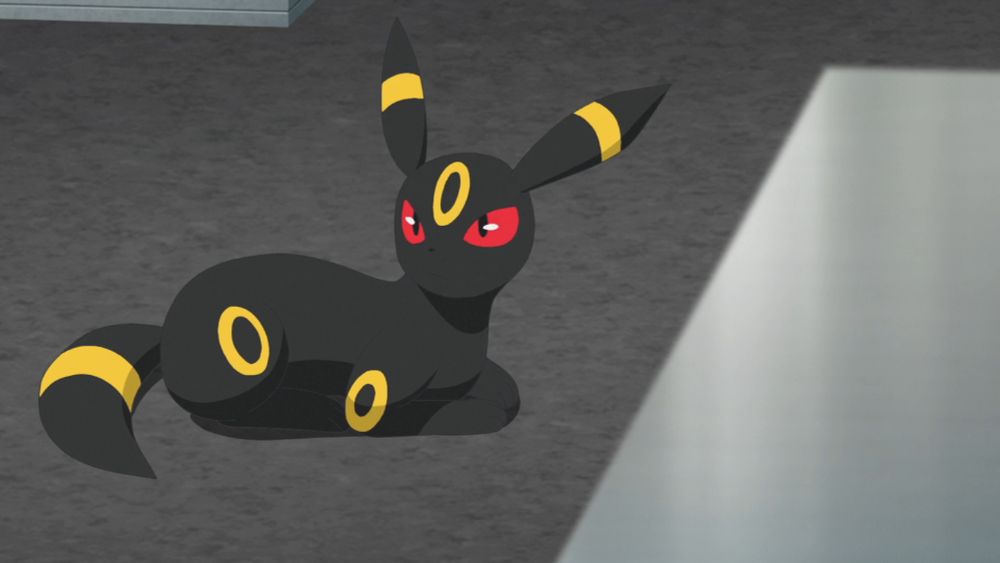 screenshot of umbreon loafing from the anime