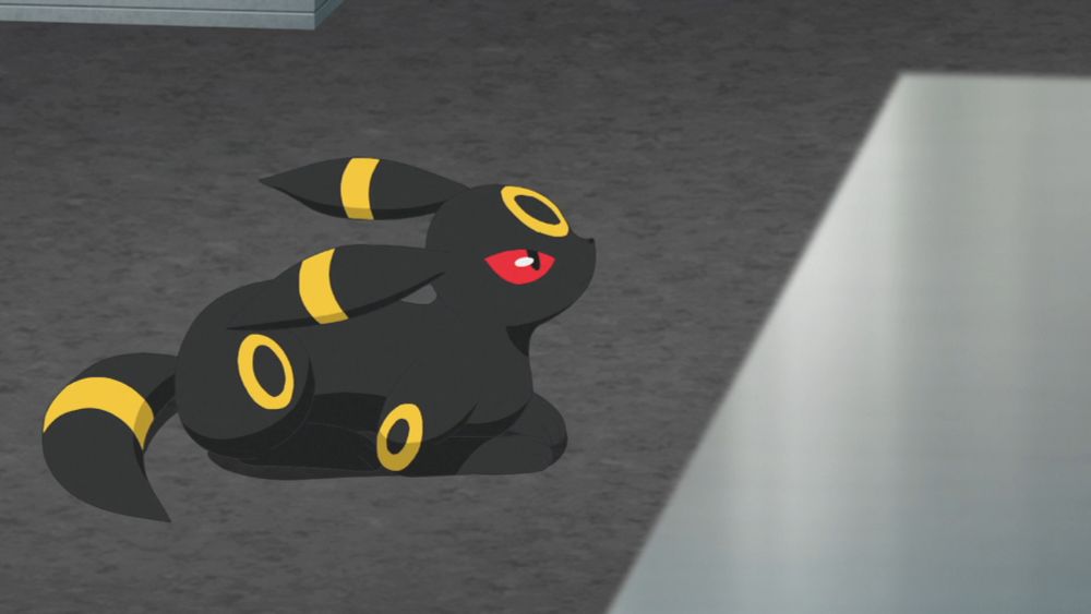 screenshot of umbreon loafing from the anime