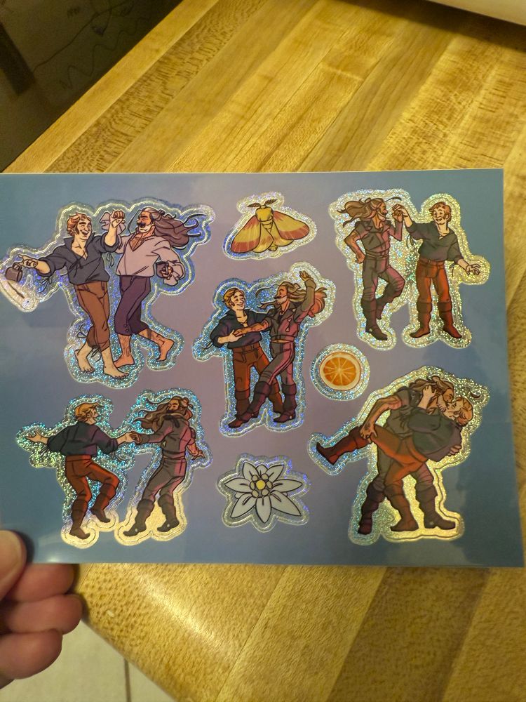 A sparkly sticker sheet of Ed and Stede in various dance poses