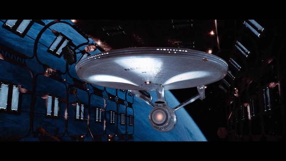 A screenshot from Star Trek: The Motion Picture showing the USS Enterprise in Spacedock.