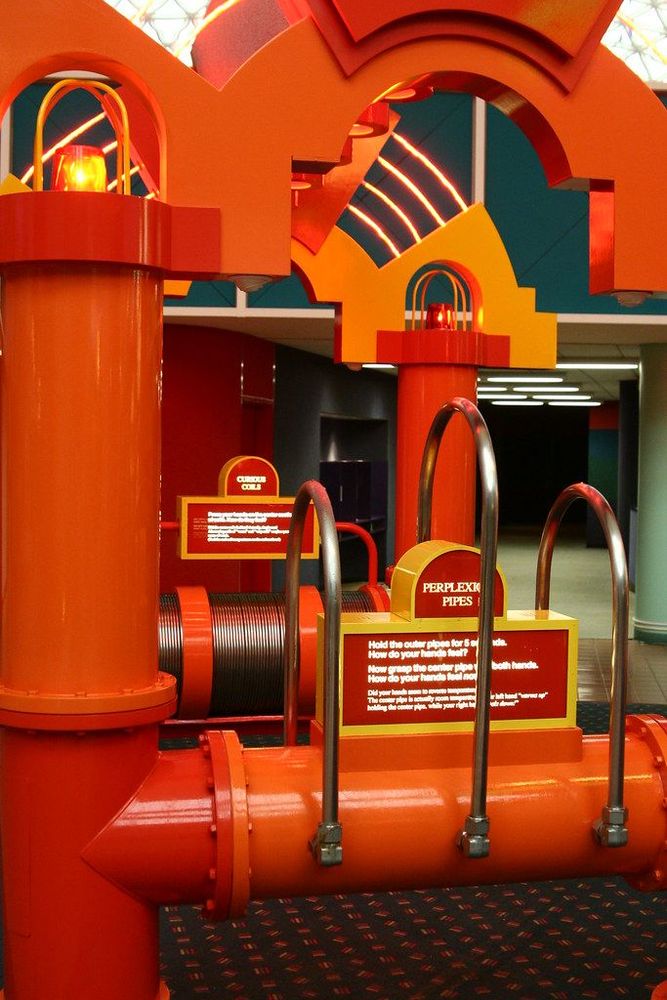 Sensory Funhouse in the Wonders of Life pavilion striking its red and orange colors
