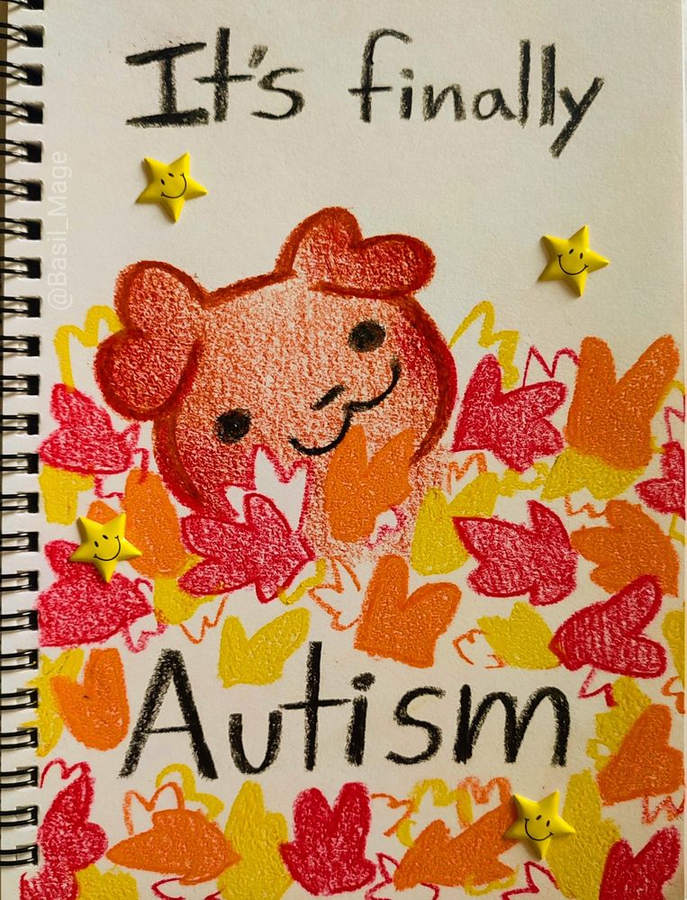 Drawing of a puppy in a pile of leafs with the caption; "It's finally autism" 