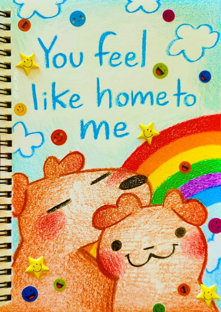 Drawing of two puppies with the caption; "You feel like home to me"