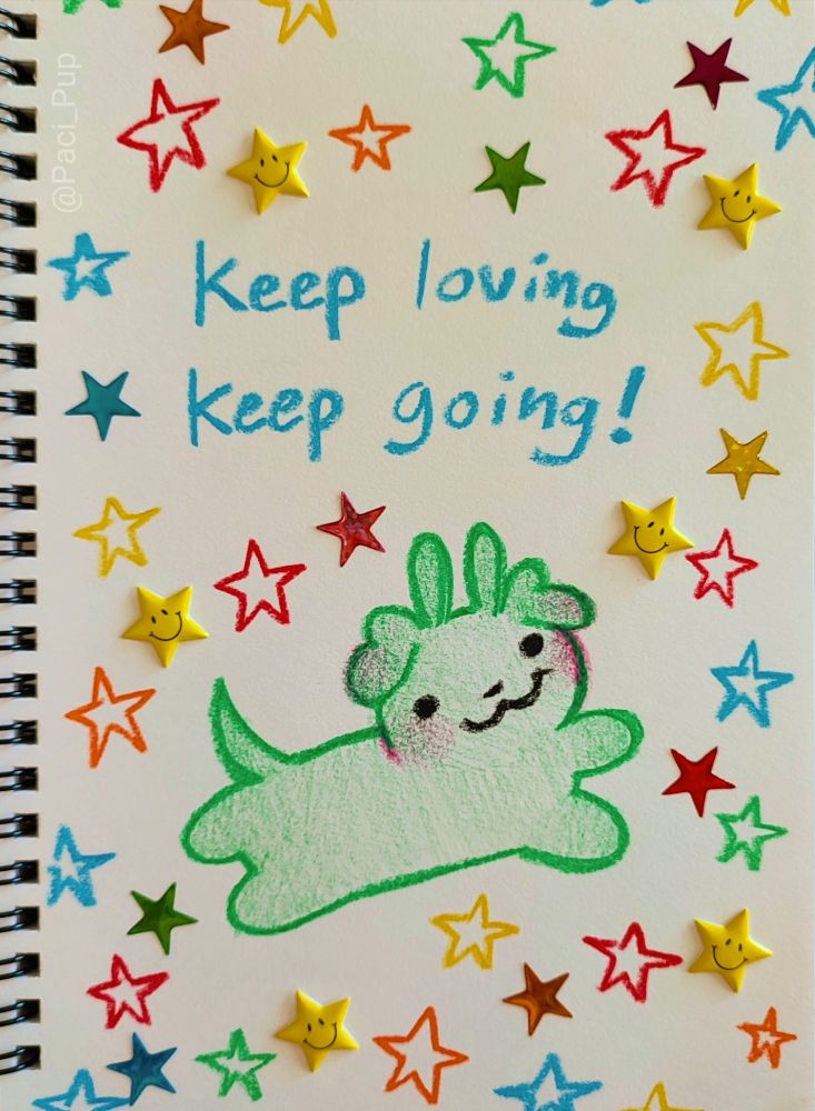 Crayon drawing of a green alien puppy and stars with the caption; "Keep loving, keep going!"