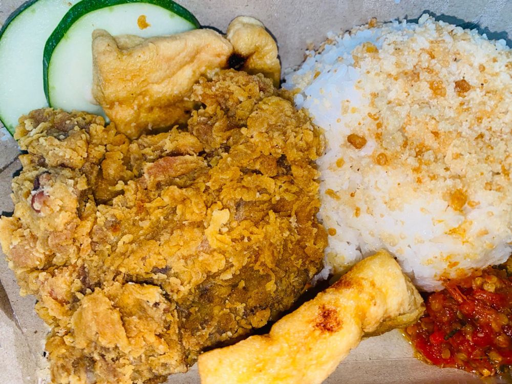 crispy chicken with rice, tofu, and sambal