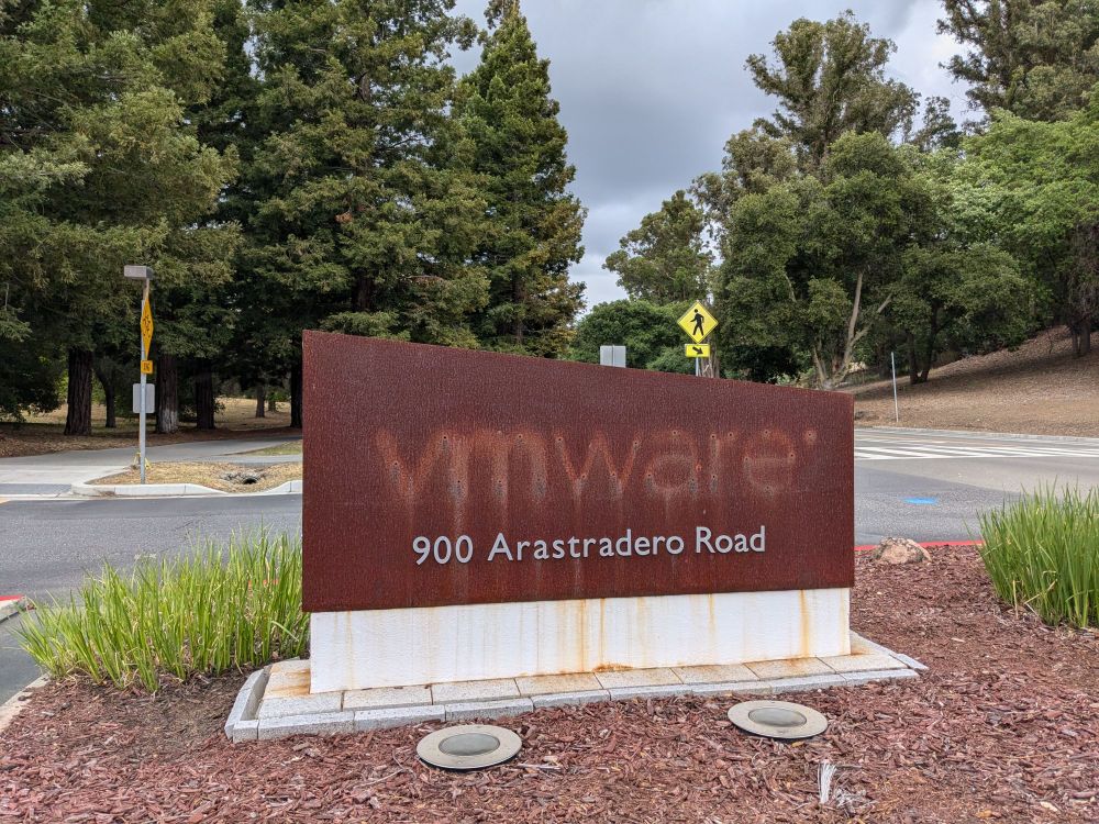 VMware sign with the letters removed leaving only a faint rusty shadow. 