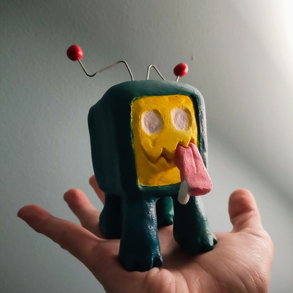 Clay TV monster at a different angle, more shadows and distant light source.