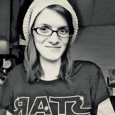 Amber in a beanie and Star Wars shirt.