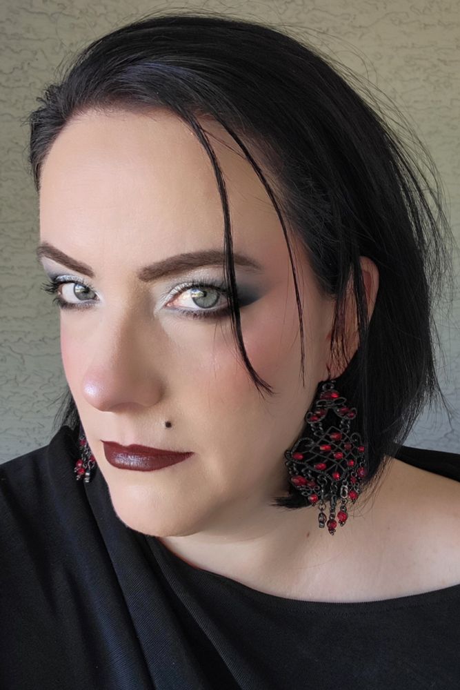 Eyes: @blendbunnycosmetics Longing palette, @themobbeauty x @jessicahazemua Trad Goth Collection
@themobbeauty Volumizing mascara @nyxcosmetics Jumbo Eye Pencil in Milk

Lips: @unearthlycosmetics x @courtneyquarantine collab Menacing Cream lipstick in Eternal
@unearthlycosmetics Smoke liner
 
Face: @milkmakeup hydro grip set + refresh spray, @aboutfacebeauty Shadow Fix Eye Primer
@hauslabs foundation 040, 01 Fair Neutral concealer, Moonstone Bio Radiant Gel Powder highlighter
@westmanatelier Biscuit bronzer stick
@themobbeauty x @courtneyquarantine - cream clay shadow M169 as blush
@makeupbymario soft blur setting powder in 2 Neutral Light
@onesize Powder Melt Glass Setting spray