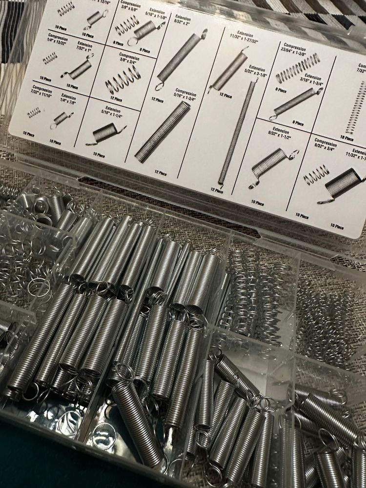 Photo of a box of assorted springs. 