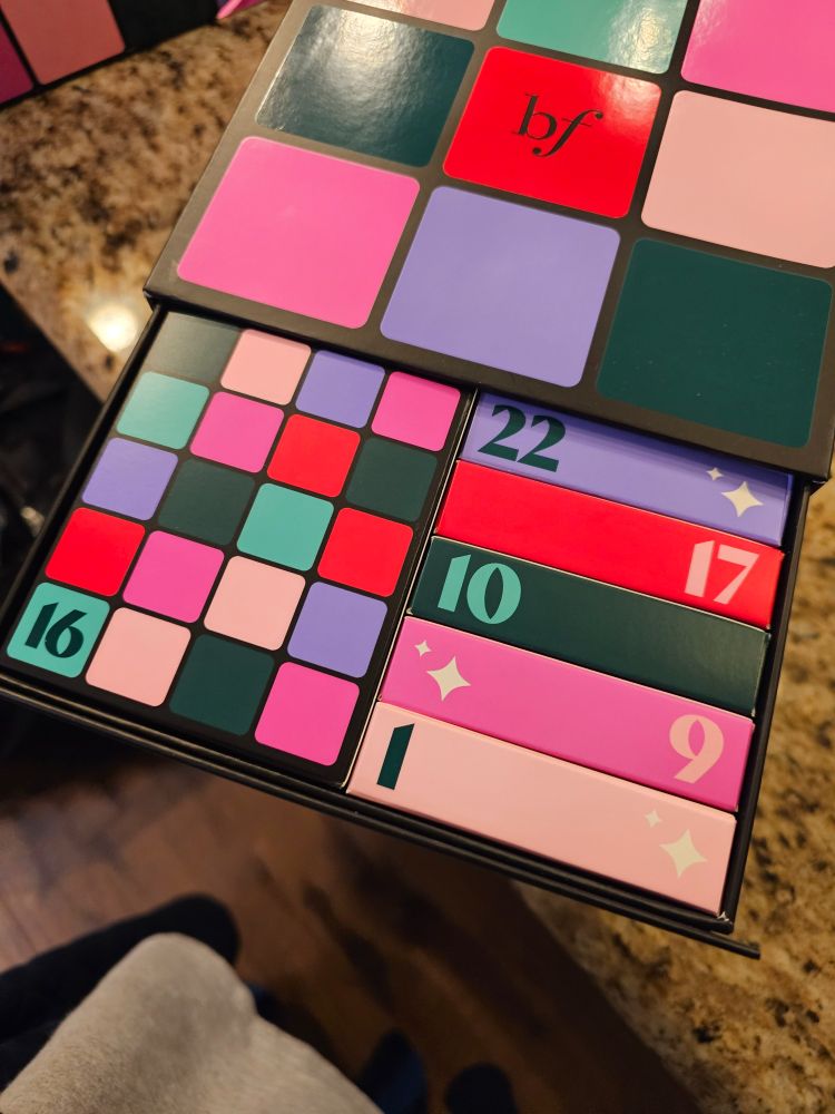 The rows of the cube are drawers in which there are numbered boxes of different sizes and shapes.  