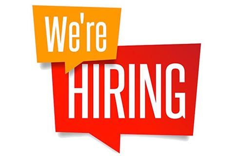 Sign says "We're HIRING"