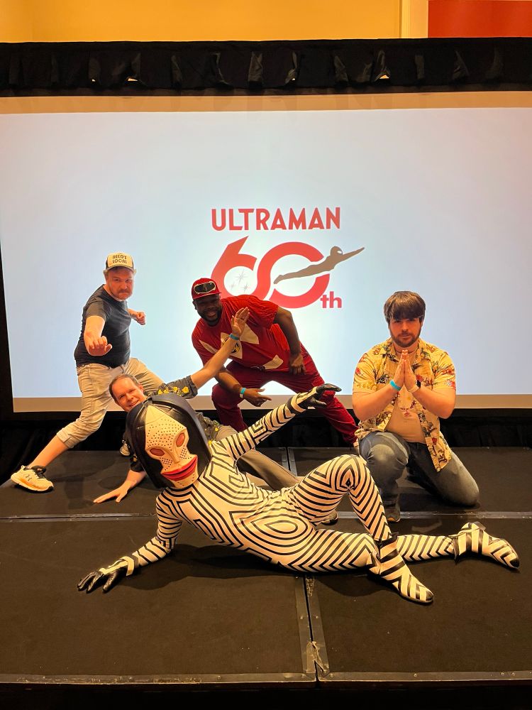 The podzooky bad boys posing with Dada from Ultraman