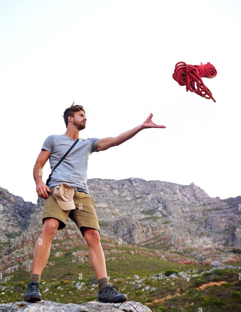 A person throwing a rope bundle. Nobody is holding the other end.