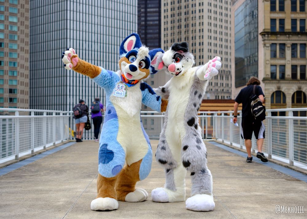 Blues and sash posing for a photo on the roof of the DLCC at AC2023