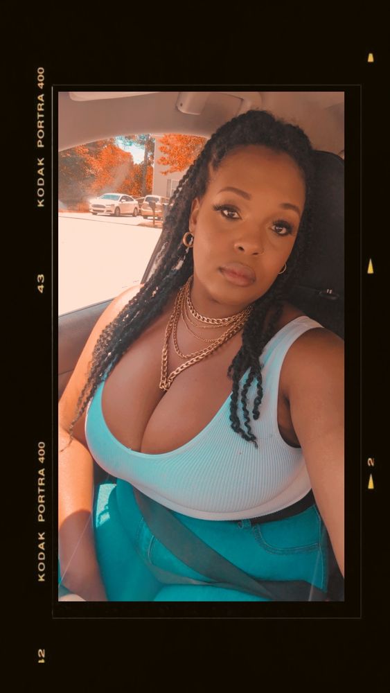 Pretty Black woman wearing gold jewelry