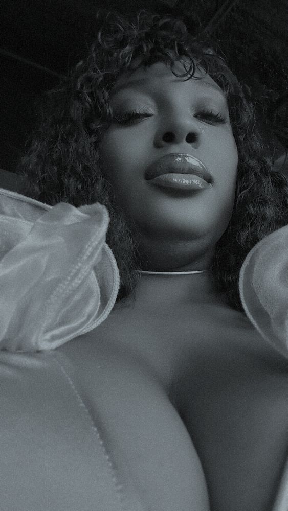 Pretty Black woman looking down