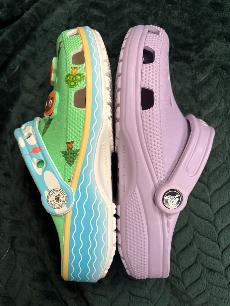 photo of 2 crocs, both size 5, a purple adults' and an animal crossing junior