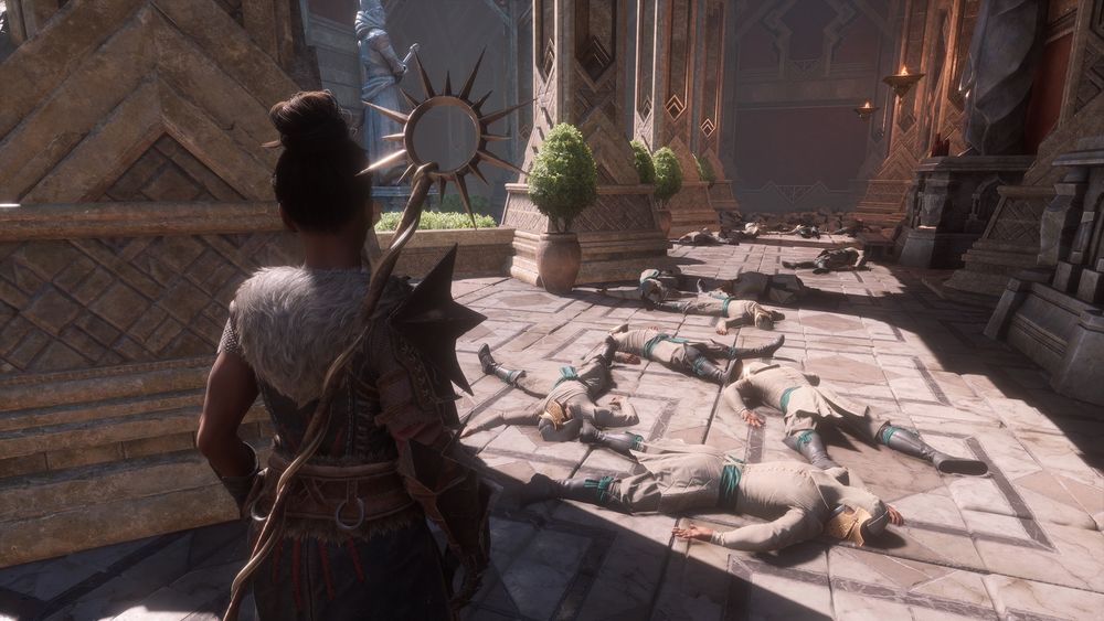 Screenshot from dragon age the veilguard of many dead slaves in the temple courtyard 