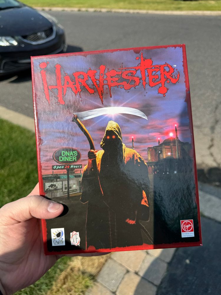 A mint condition big box copy of the PC game Harvester. 