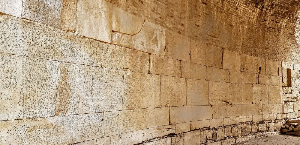 An image of the Gortyn Code, the oldest surviving Greek law code.