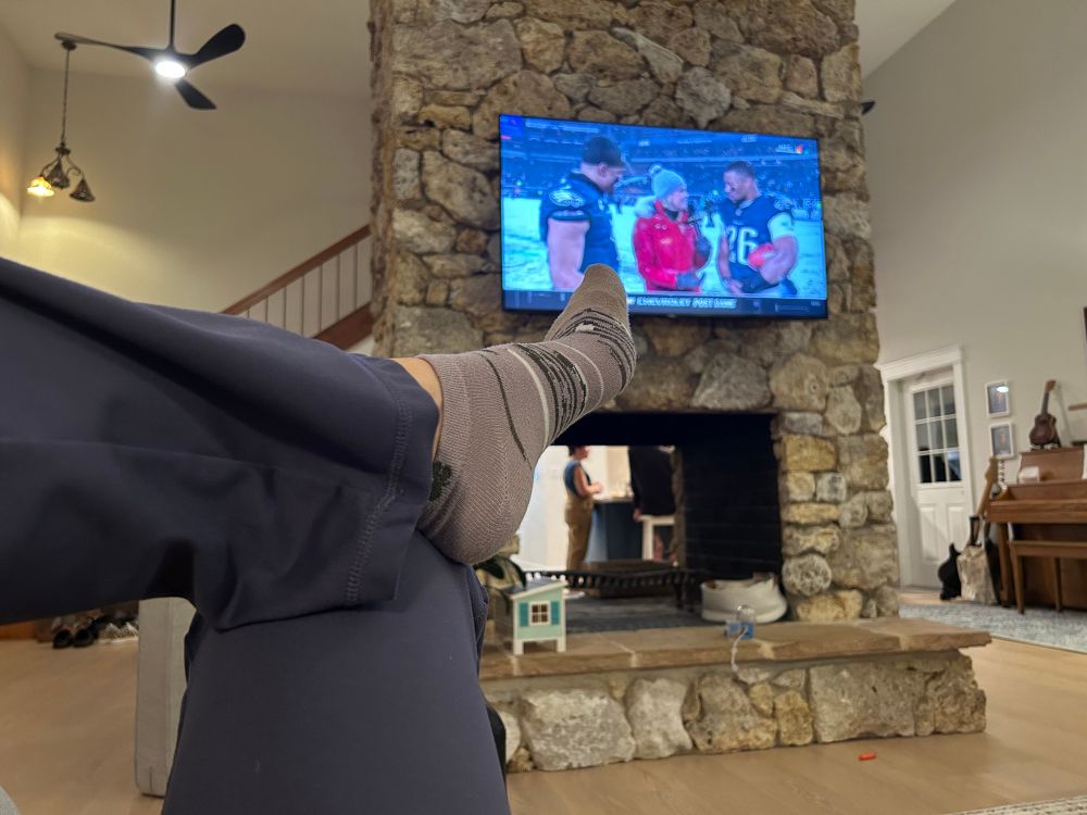 Feet up watching a snowy football game