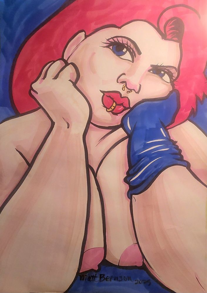 Portrait of a woman holding her head up with one blue glove on