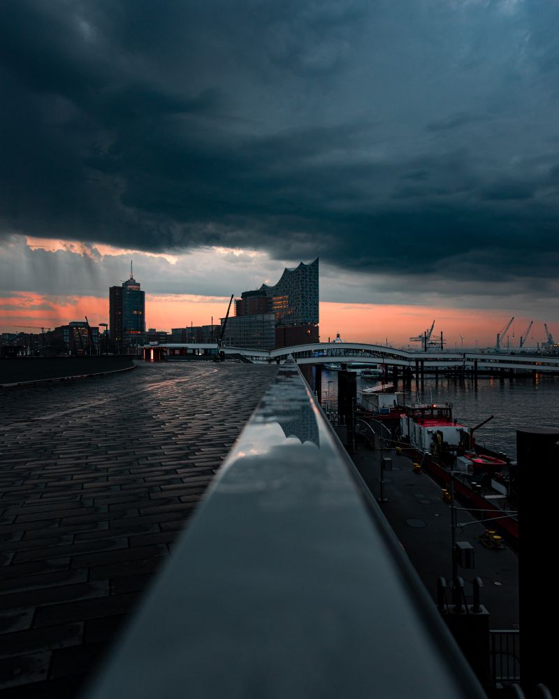 An early morning view of the Elbphilharmonie using a reflective surface.
