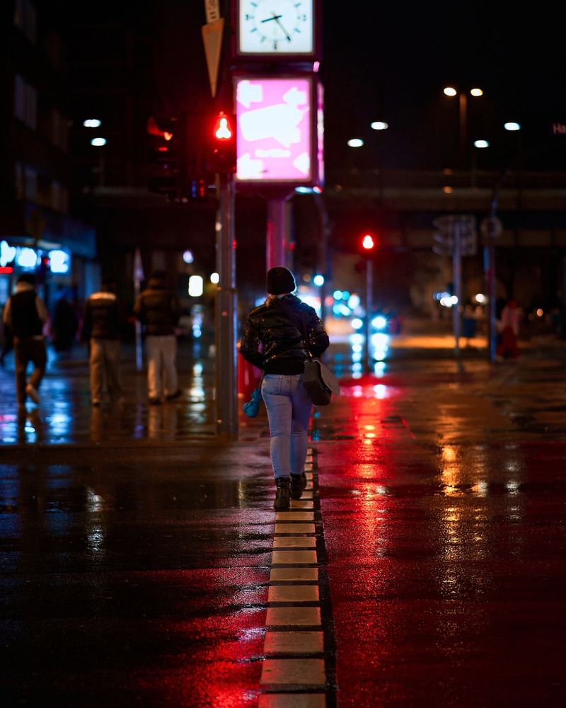 A woman crossing the road
