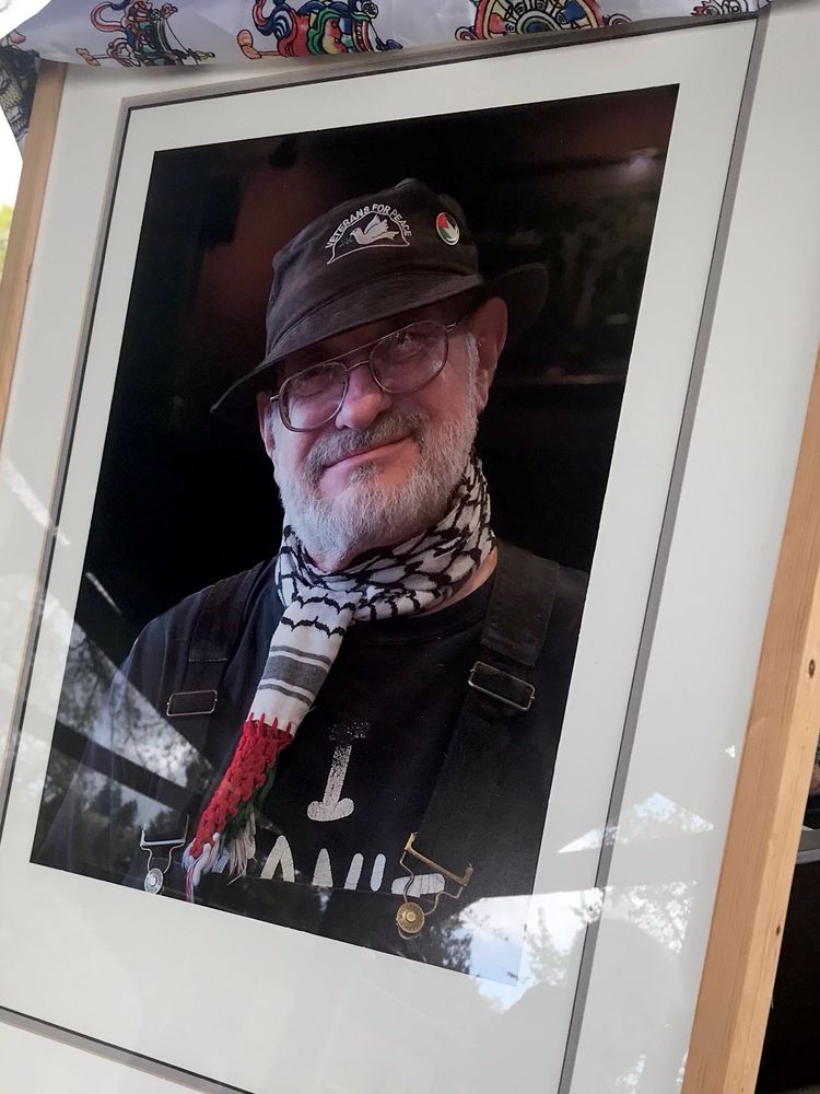 Portrait from a memorial service: Our comrade, peace & social justice activist Malcolm Chaddock.