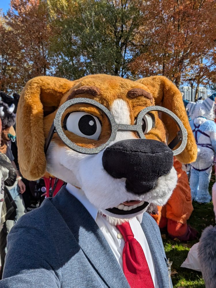 Fursuit photo of Scritch outside 