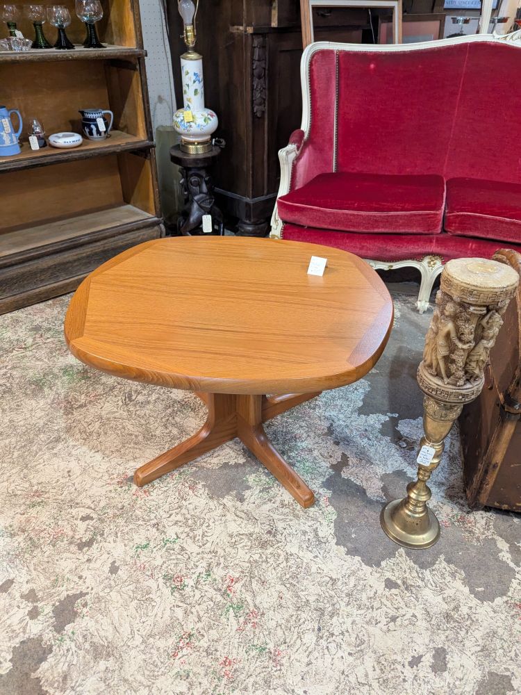A cute little teak coffee table