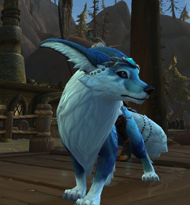 Blue and white fox mount, called Vulpine Familiar, from the game World of Warcraft