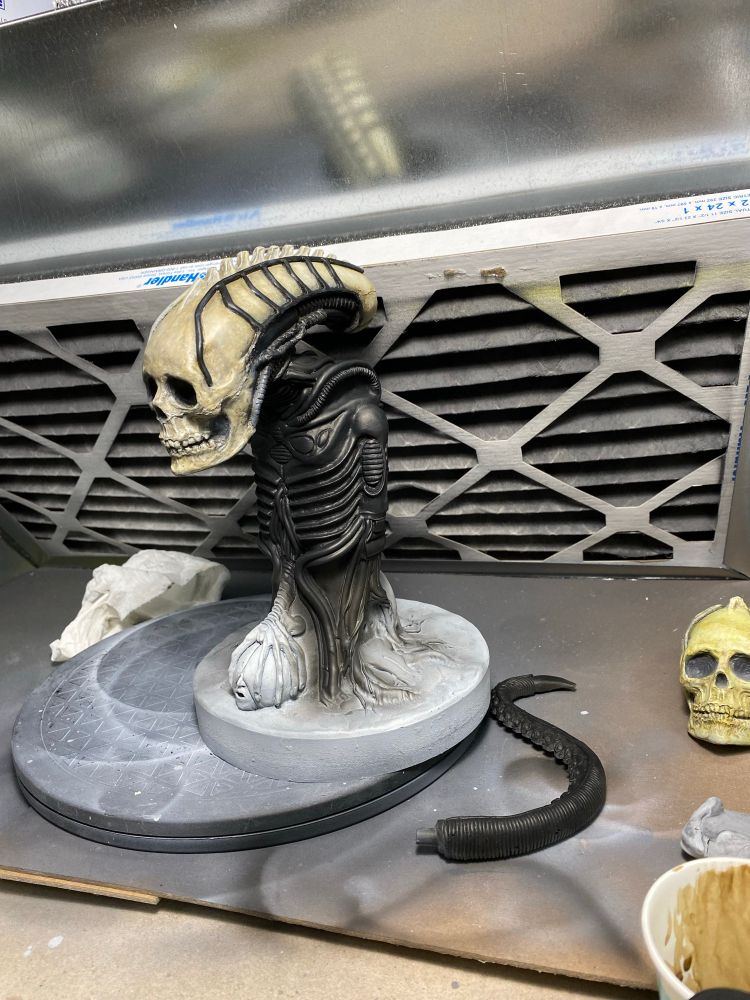 Biomechanical in desktop spray booth. Skull painted a bone color with black highlights. Part of the body painted a rich black.