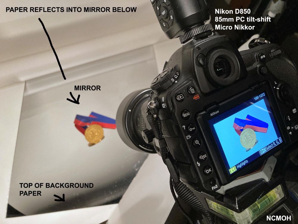 tabletop studio set using a mirror as the background. 