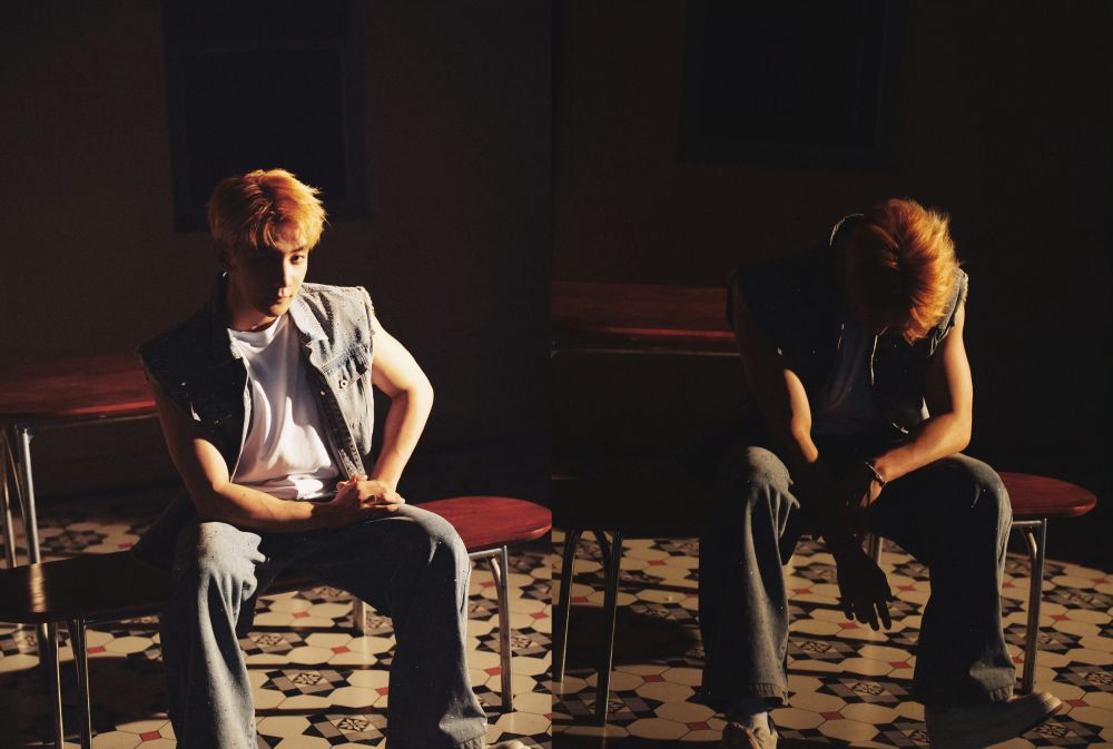two images of xia zhiguang sitting in a dim kitchen with light shining on him. 