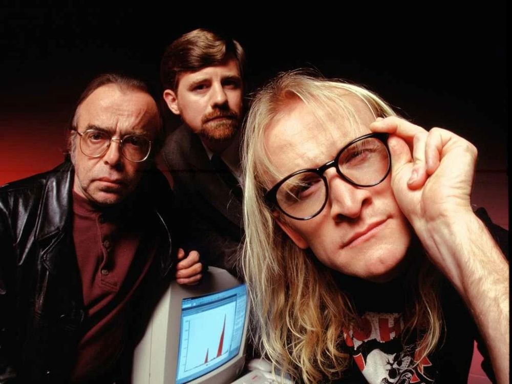 a picture of the three "Lone Gunmen" characters from The X-Files