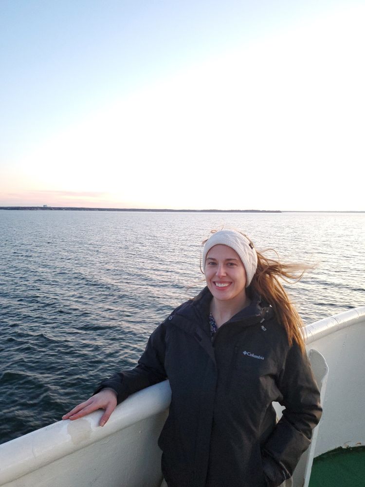 Taylor on a boat over the Long Island Sound