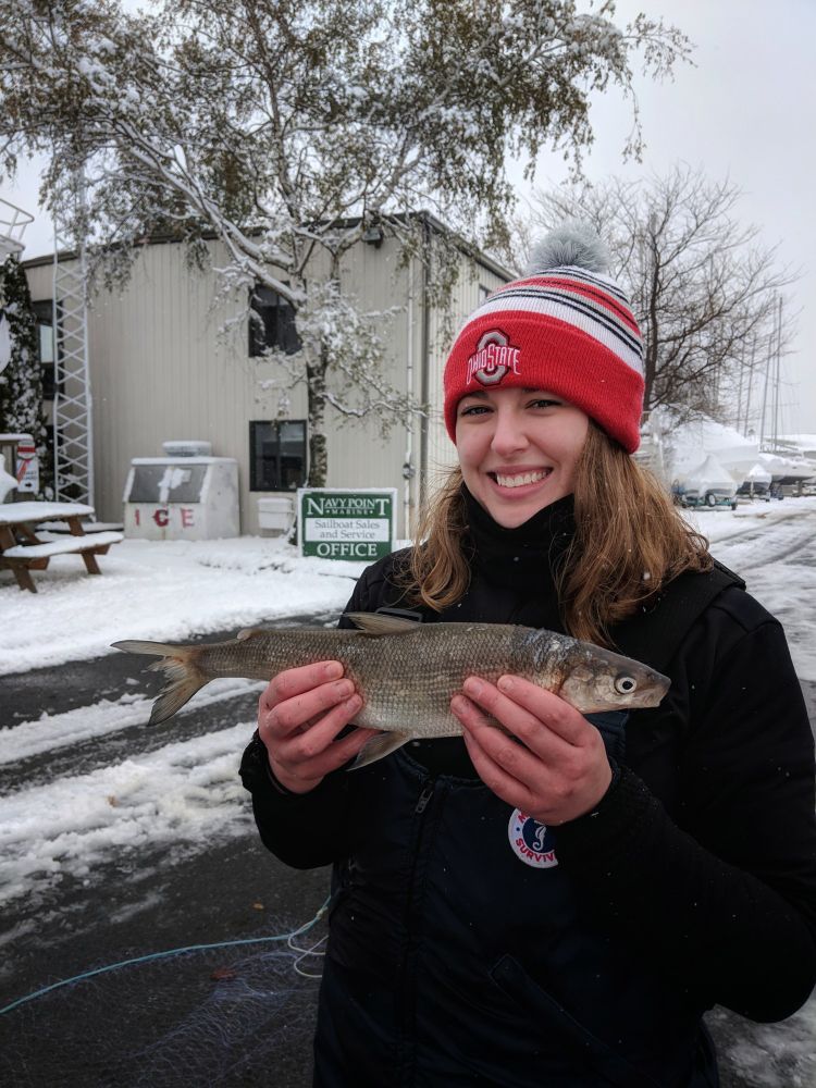 Taylor holding a lake whitefish