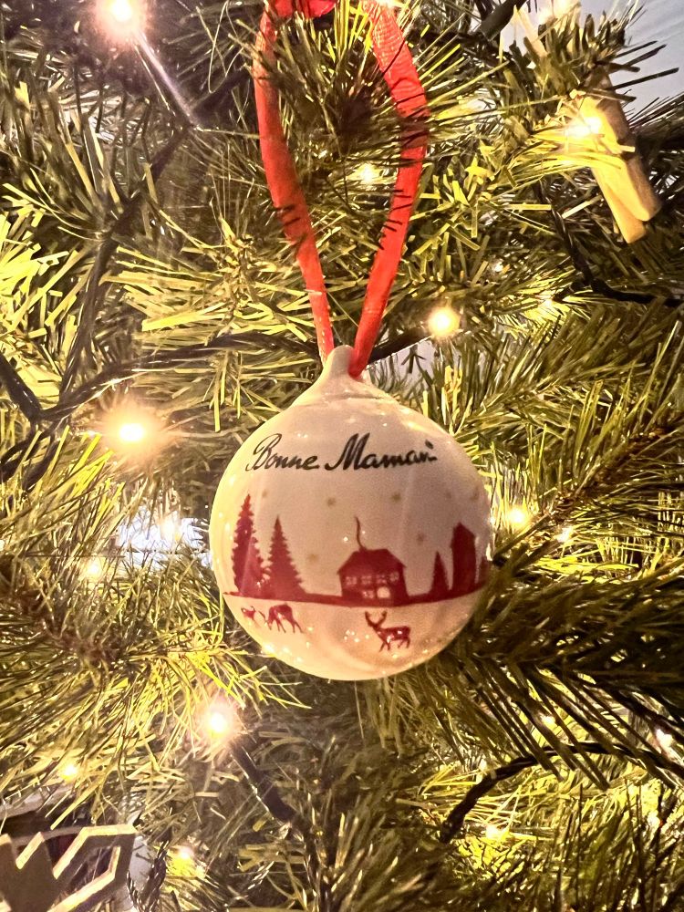A Bonne Maman bauble on a Christmas tree 