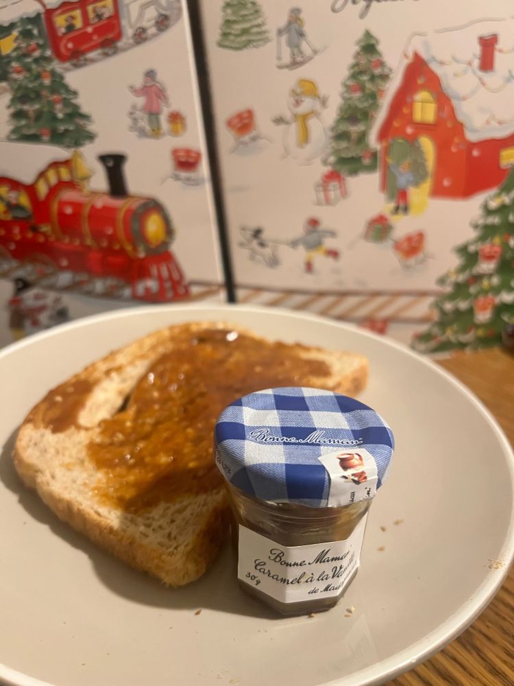 A Bonne Maman pot with a blue lid, with Milk Caramel with Madagascar Vanilla Spread 