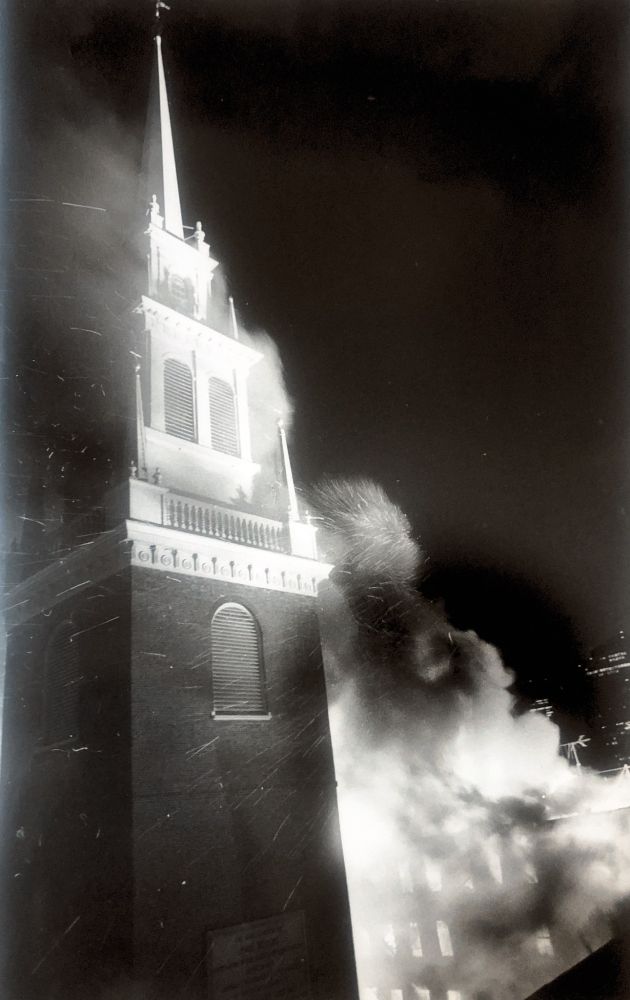 A black and white photo from July 20, 1978 of flames next to the Old North Church.