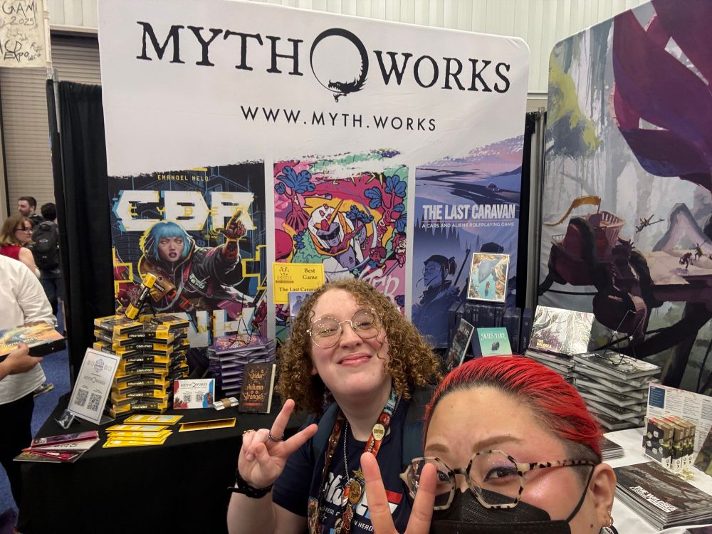 Josephine with El at the Mythworks Gencon booth 2669