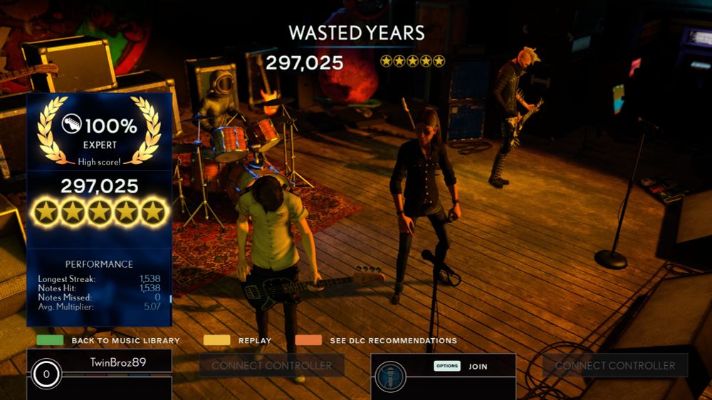 A screenshot from Rock Band 4, showing a 100% Full Combo (FC) for Iron Maiden's "Wasted Years" on Expert Guitar. 