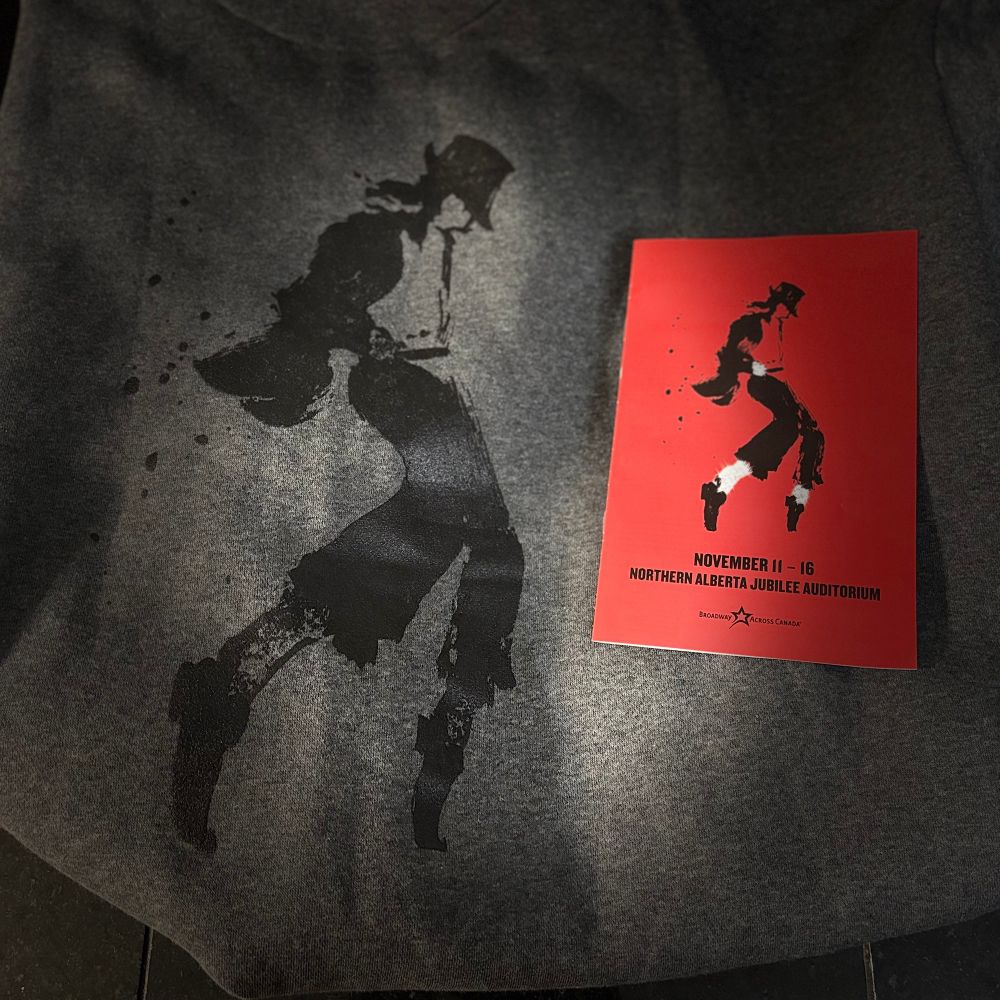 Black Michael Jackson silhouette on gray sweatshirt