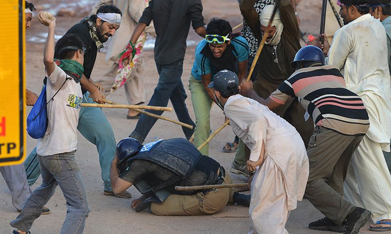 PTI goons hitting law enforcers