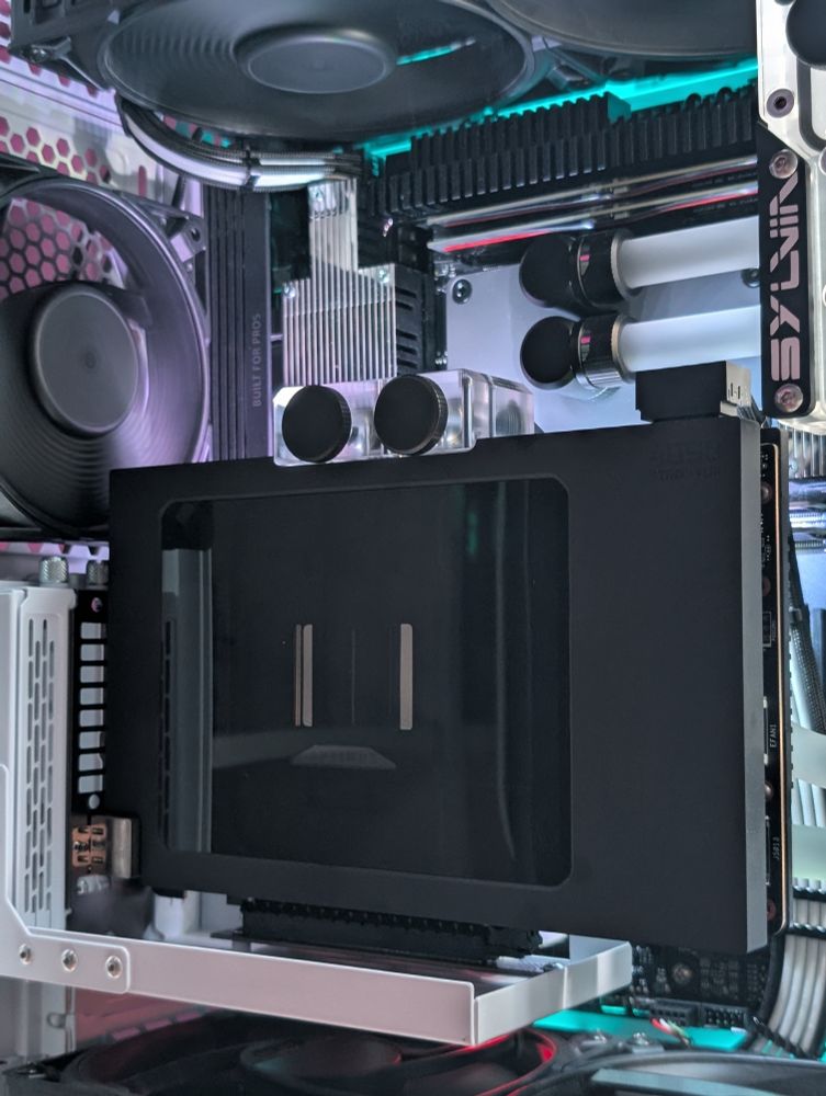 Close up of the water cooling components inside the gaming PC from Optimus Water Cooling and Singularity Computers