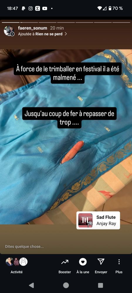"à force de le trimballer il a été malmené jusqu'au coup de fer à repasser de trop ..." 

Un trou a été fait dans le châle 