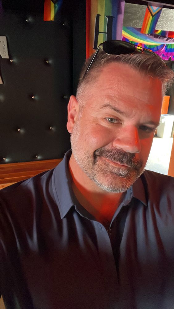 Old man sitting in a bar 