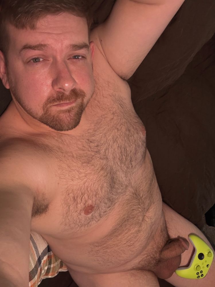 Naked guy with Xbox controller